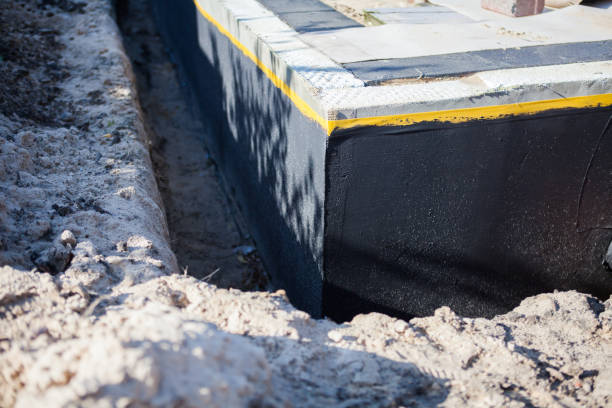 Professional Waterproofing technician working in Gilbertsville, PA